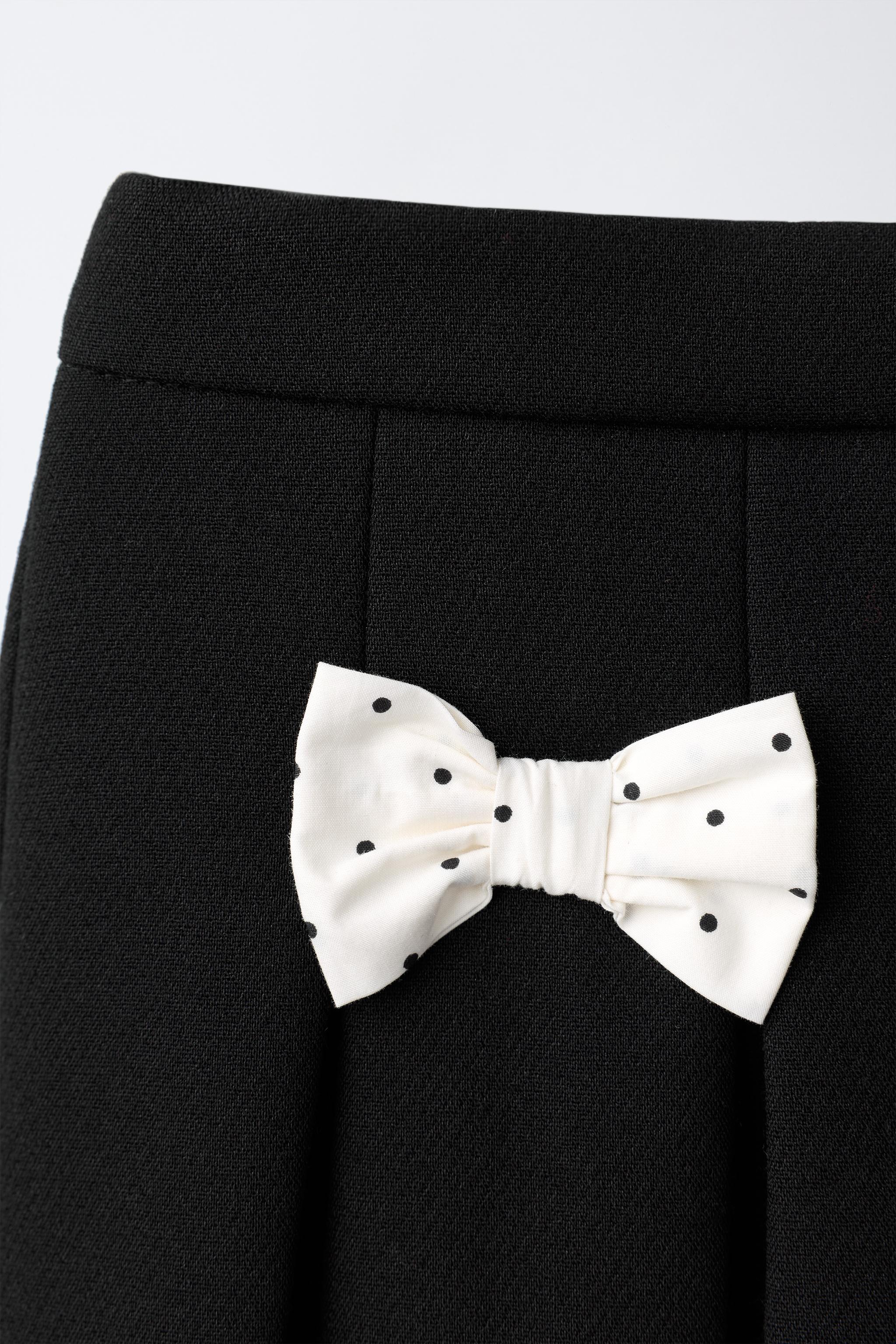 POLKA-DOT BOW BERMUDA SKIRT